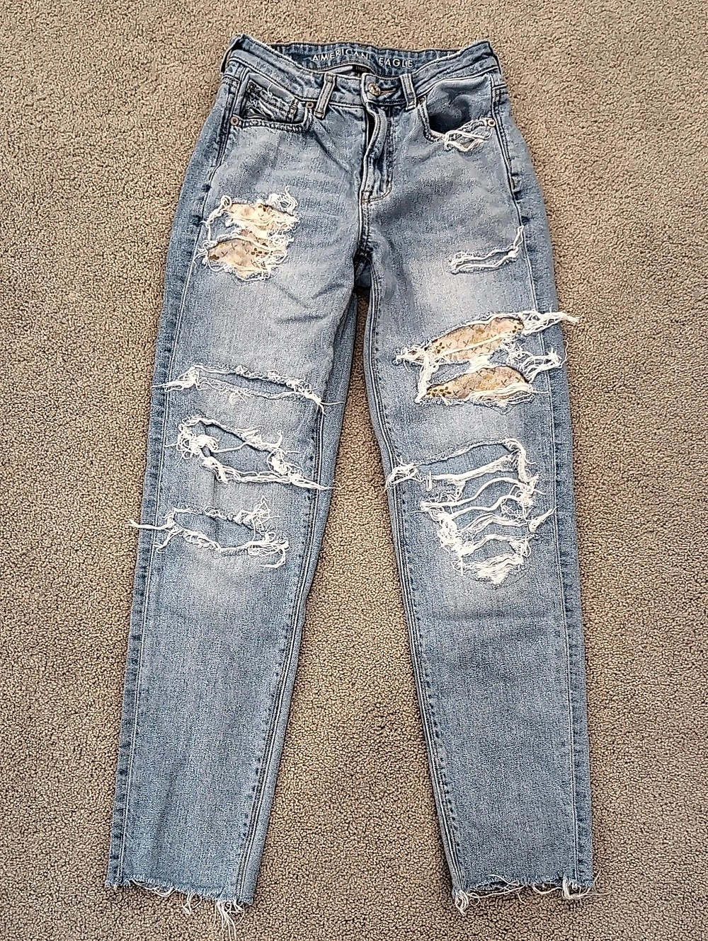 American Eagle Strigid Distressed Skinny Jeans in Blue Waist 00